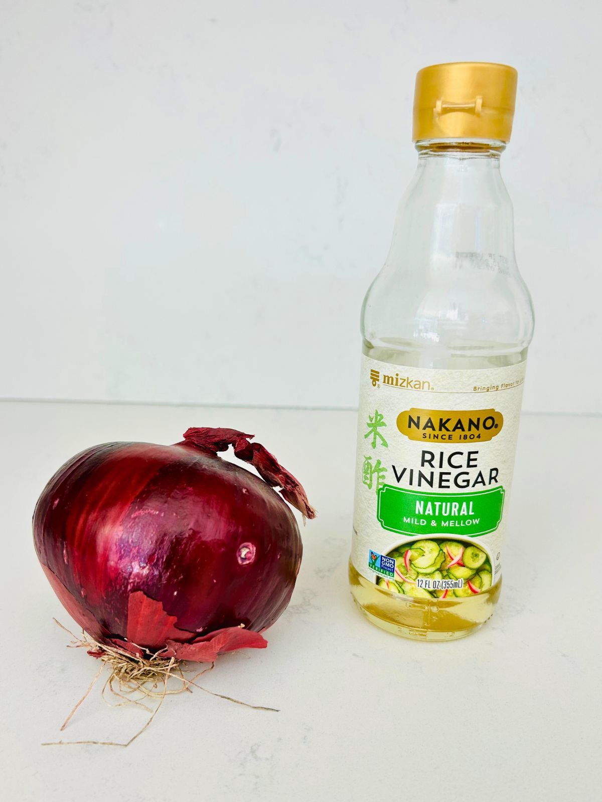 The two ingredients needed to make quick pickled red onions.