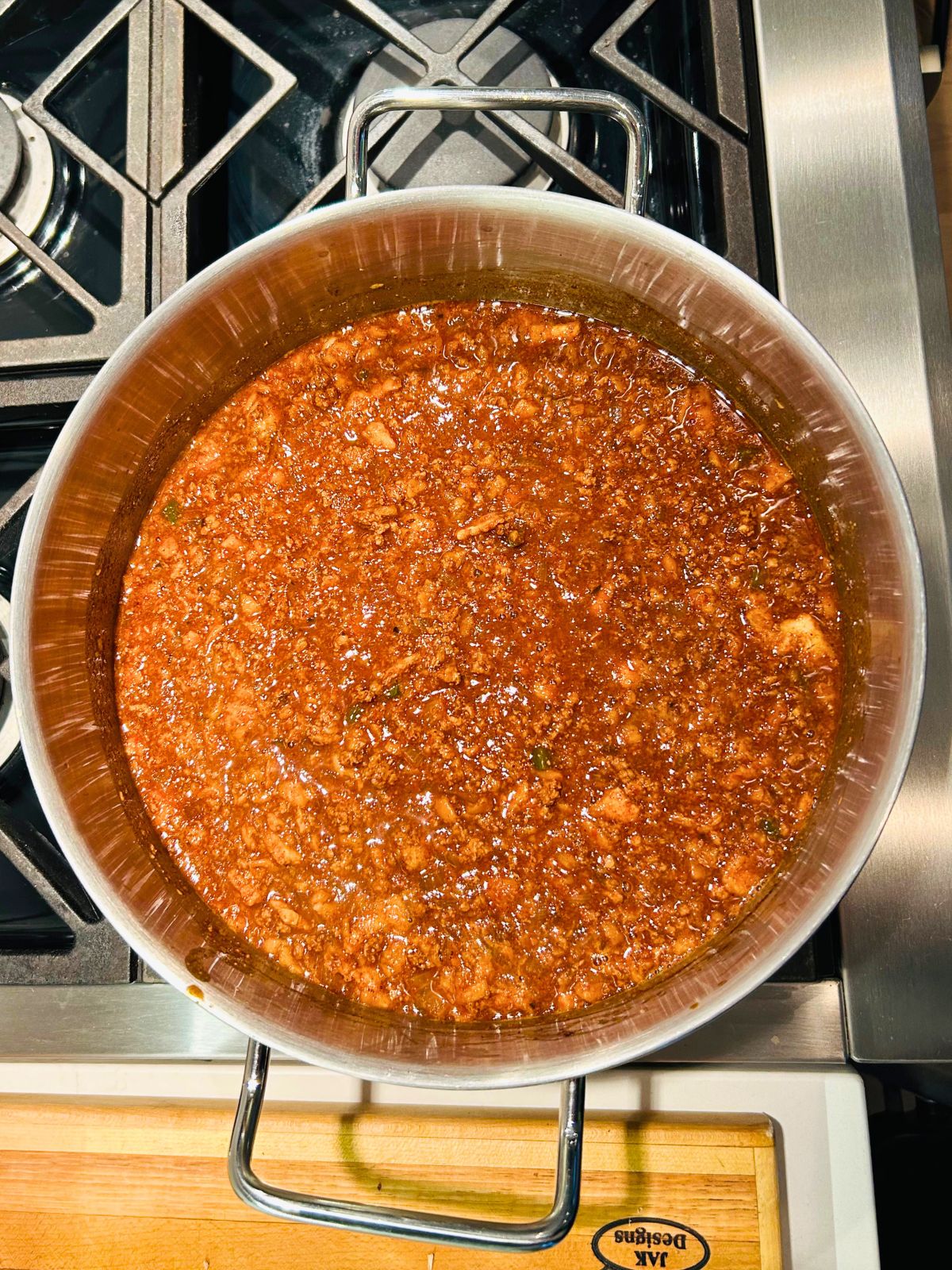 The chili is mixed in the pot and ready to simmer for 30 minutes.