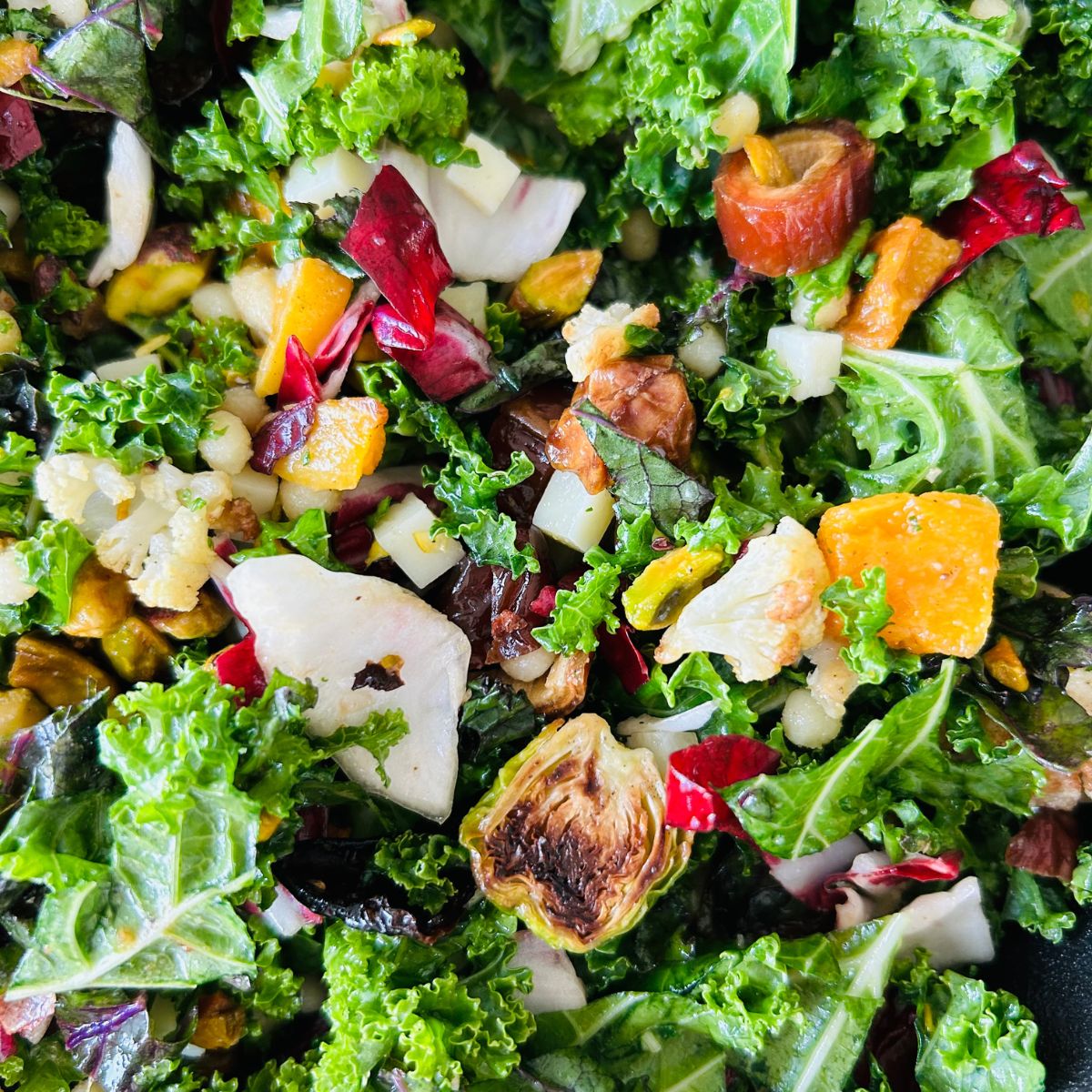 Roasted Brussels Sprout, cauliflower, and butternut squash mixed with chopped kale.