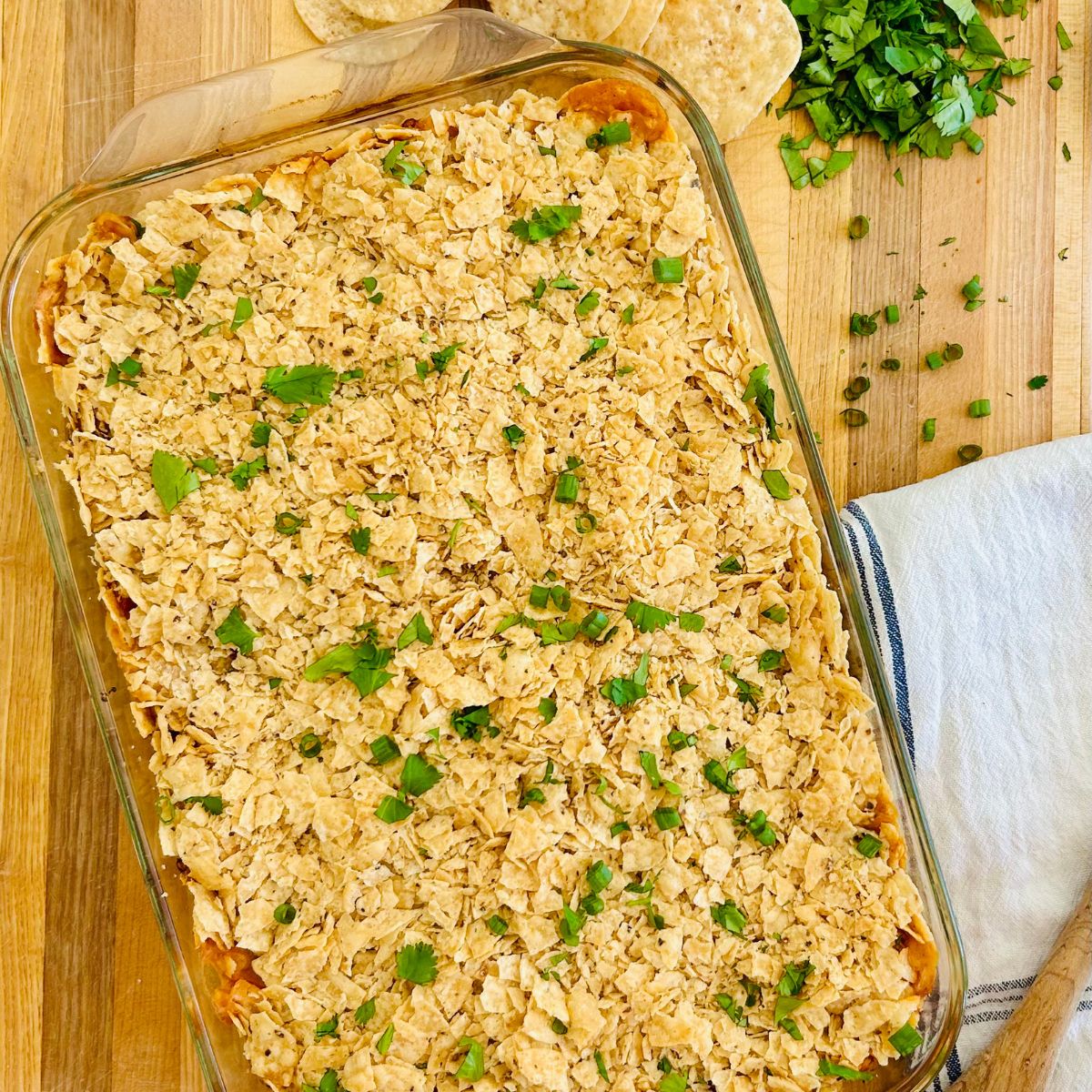 Taco casserole with tortilla chips baked in the oven and ready to serve.