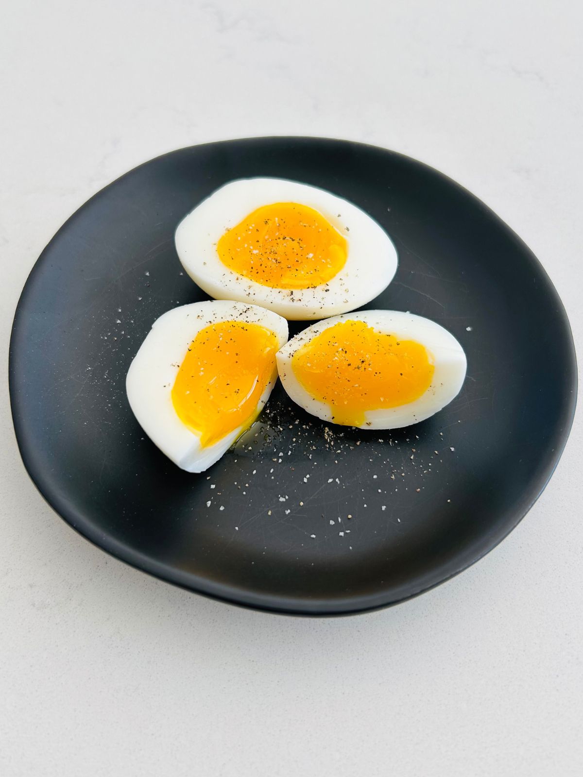 Side view showing the consistency of a medium boiled egg.