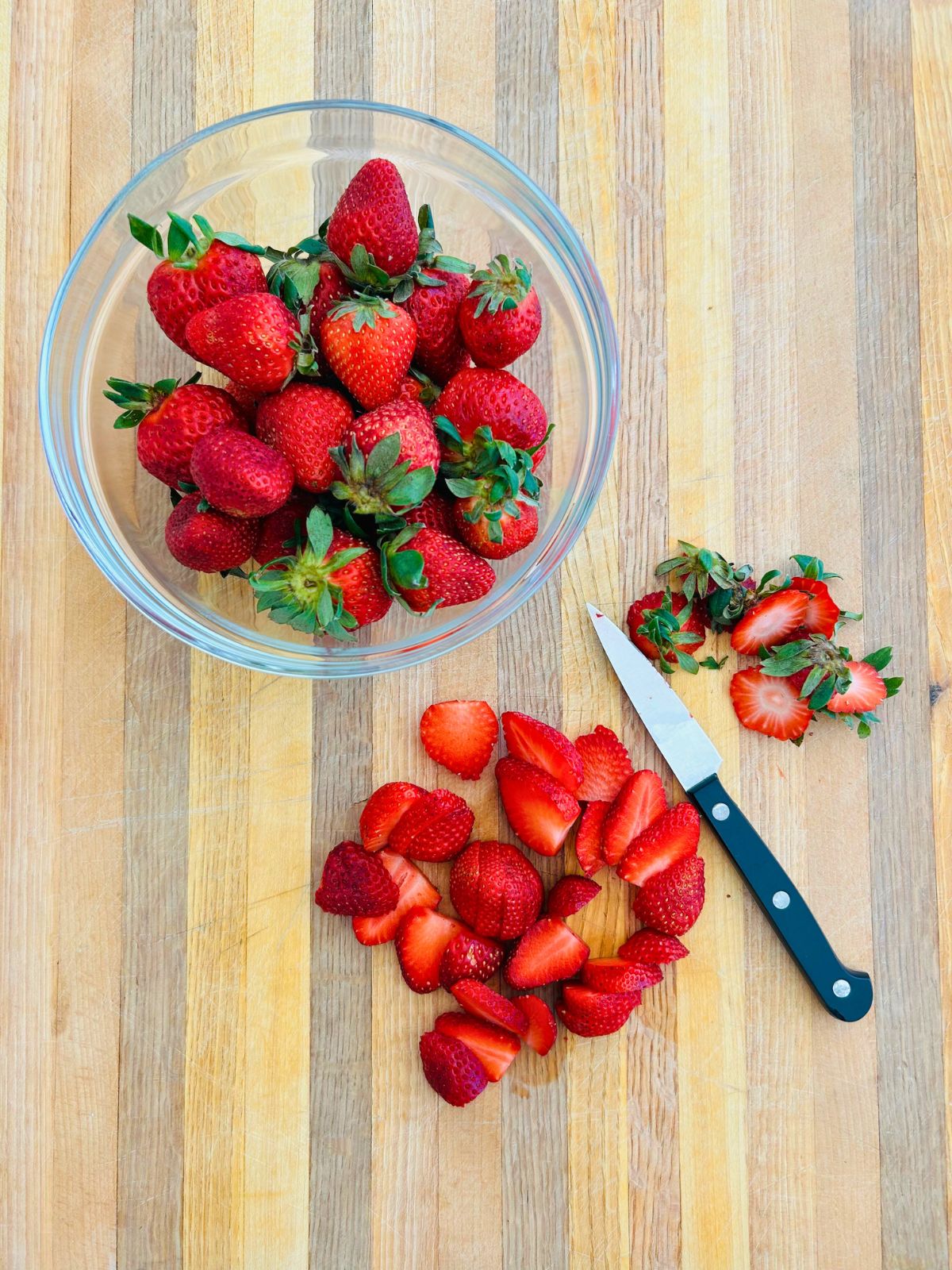 Strawberries with the tops cut off and sliced into quarter-inch slices.