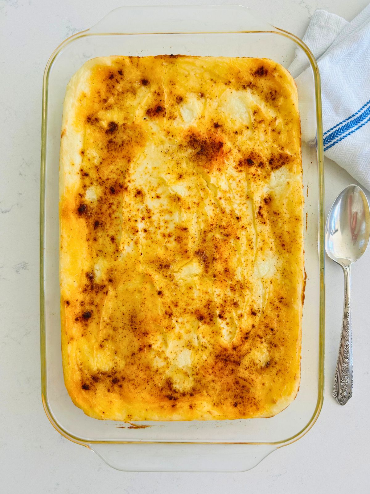 Mashed potato casserole has been baked and ready to serve.