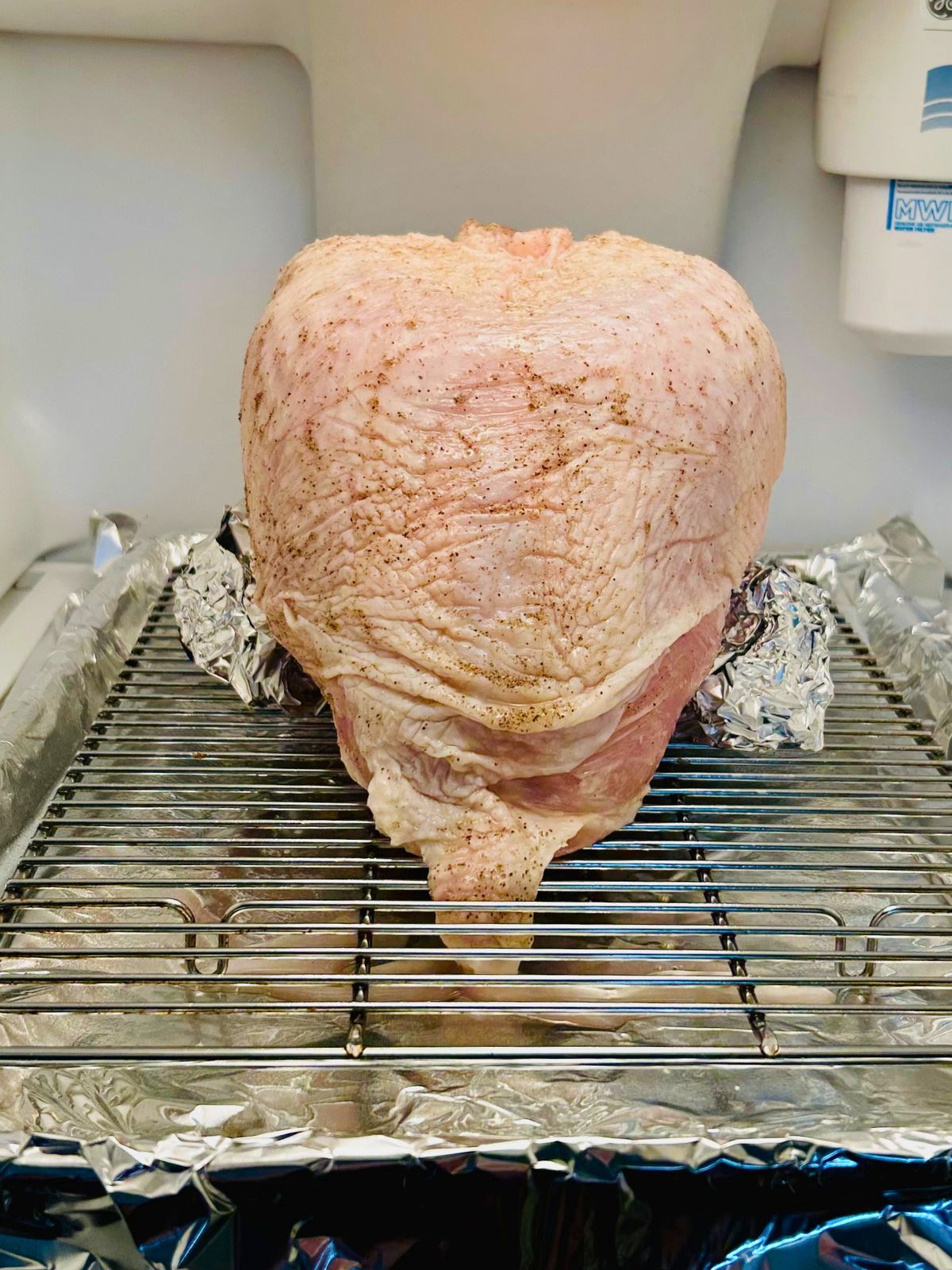 Dry-brining the turkey breast in the refrigerator.