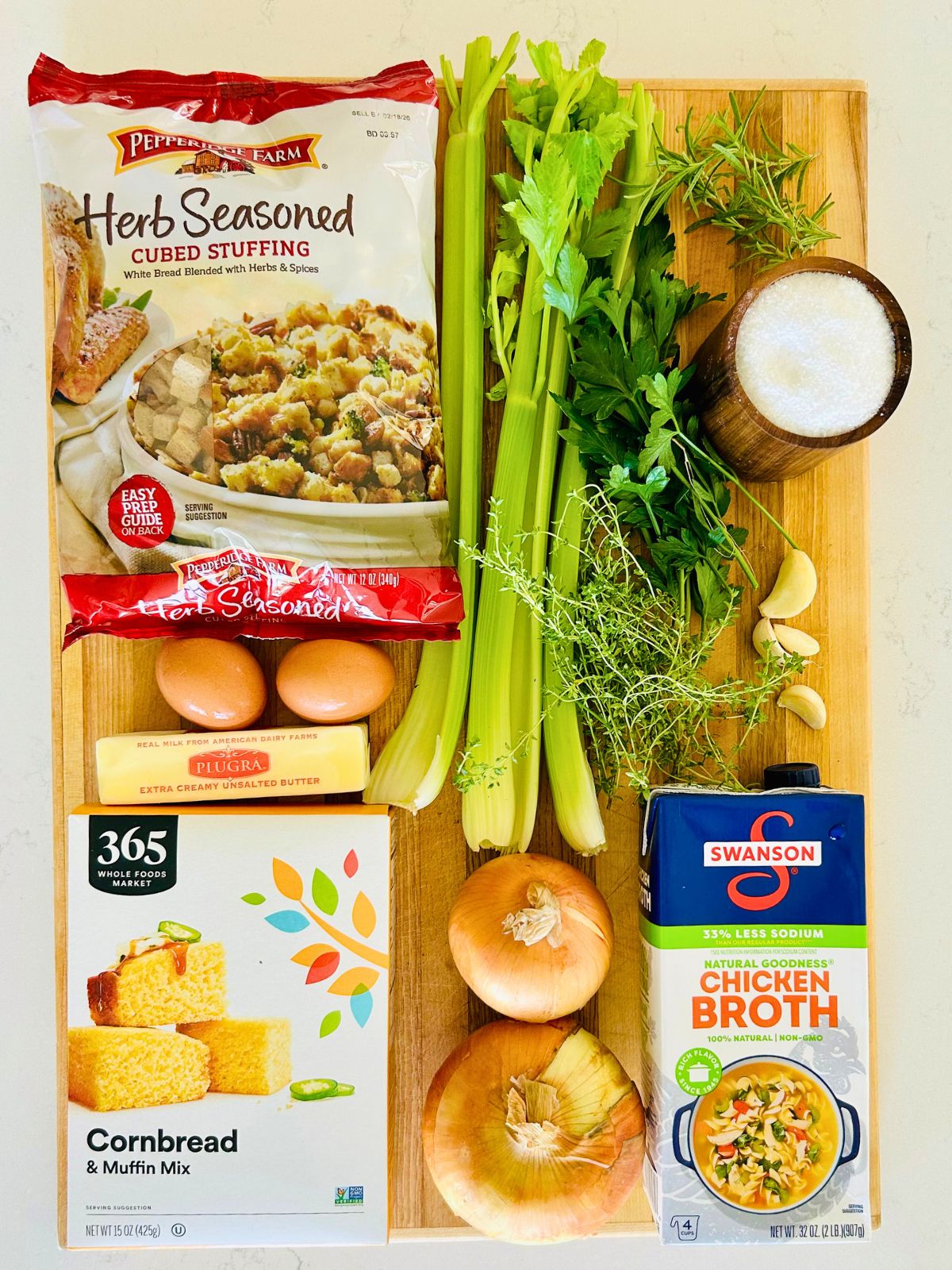 All of the ingredients needed for this stuffing recipe with two breads.