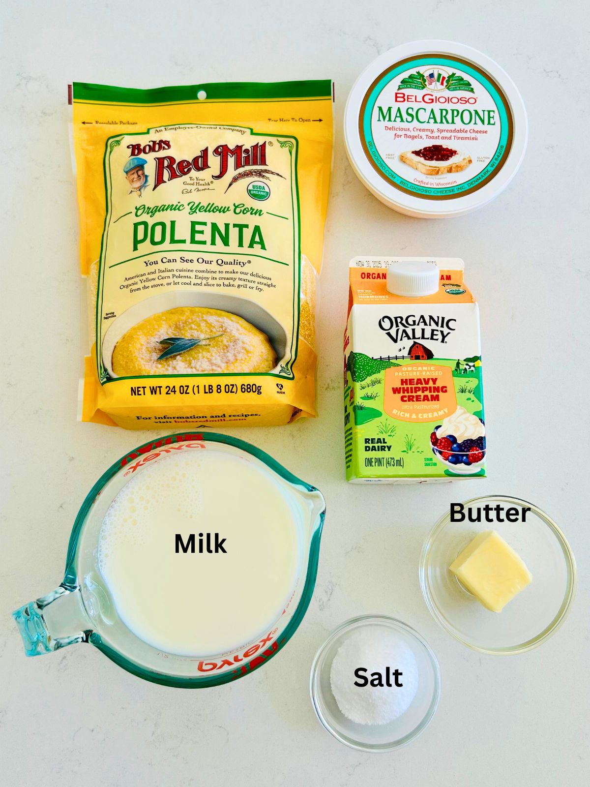 All of the ingredients needed to make creamy polenta with mascarpone.