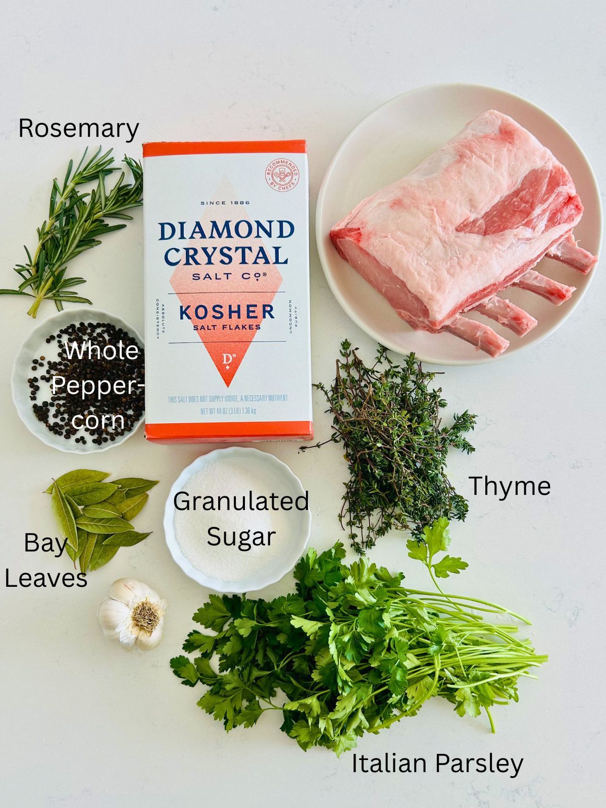 The ingredients needed to make an herb and garlic-brined pork rib roast.