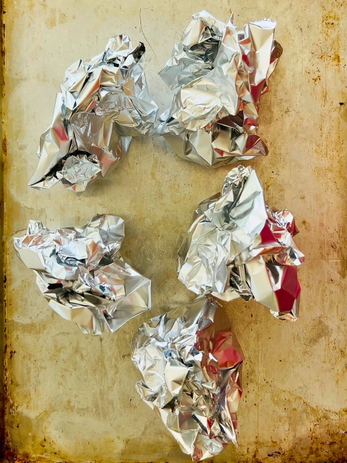 Foil-wrapped golden beets ready to roast in the oven for chilled golden beet soup
