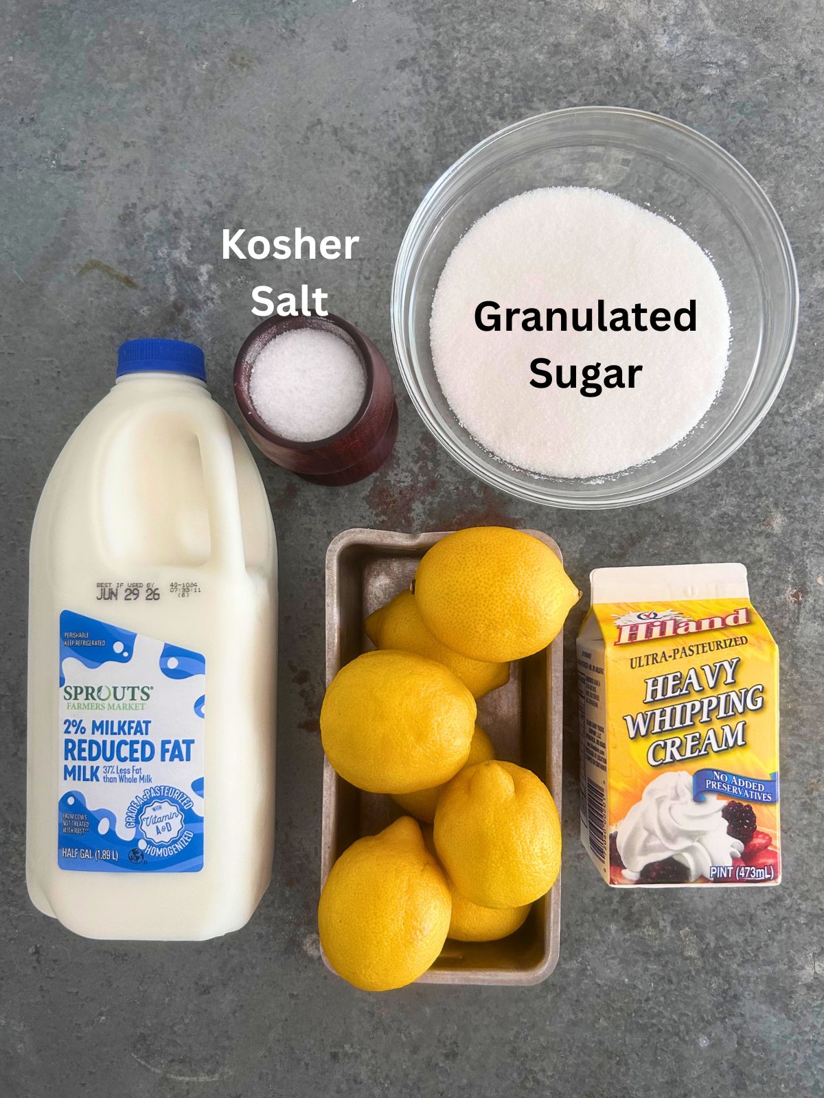 All of the ingredients needed to make homemade lemon ice cream.