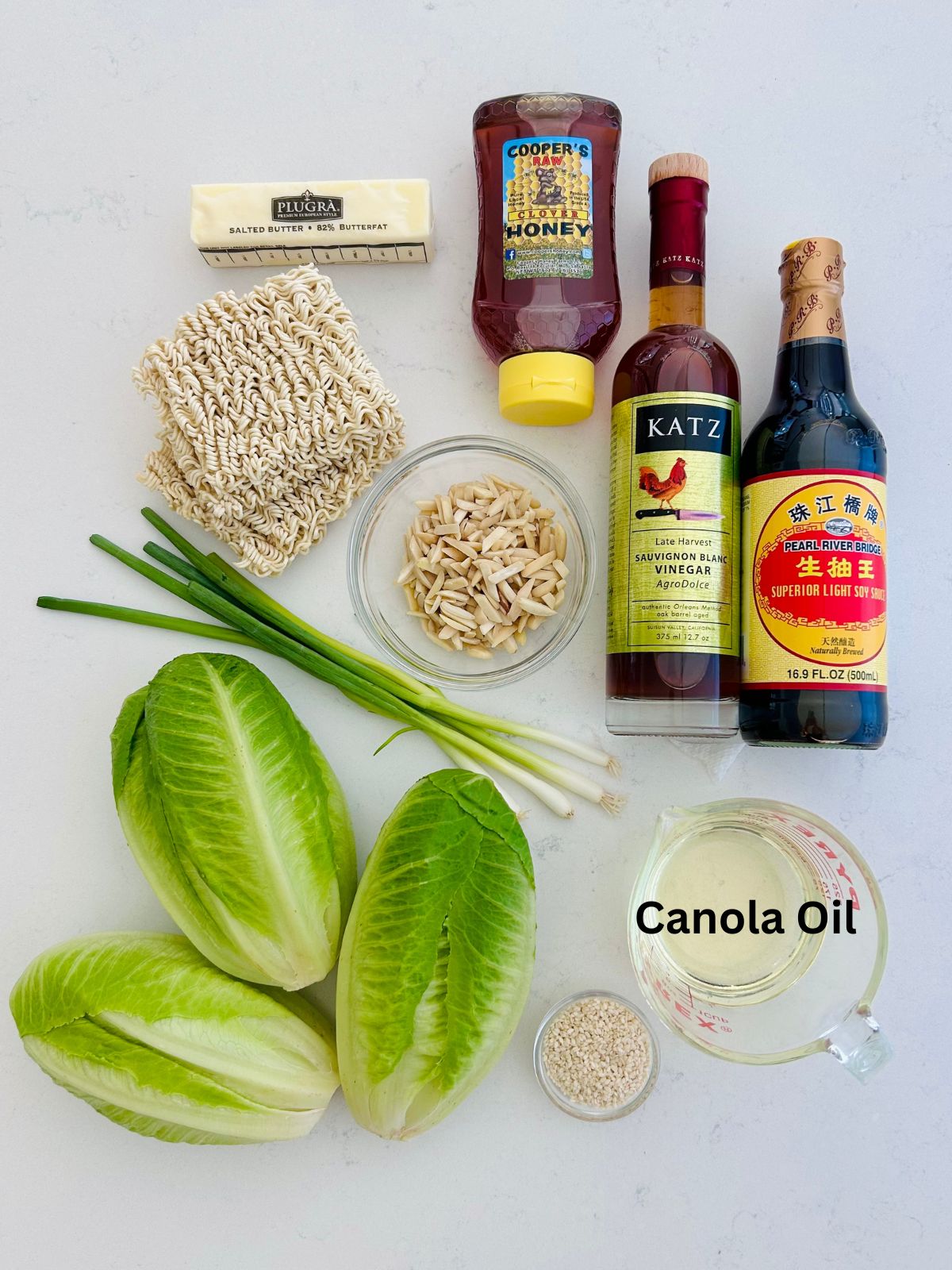 All of the ingredients needed to make crunchy romaine salad.