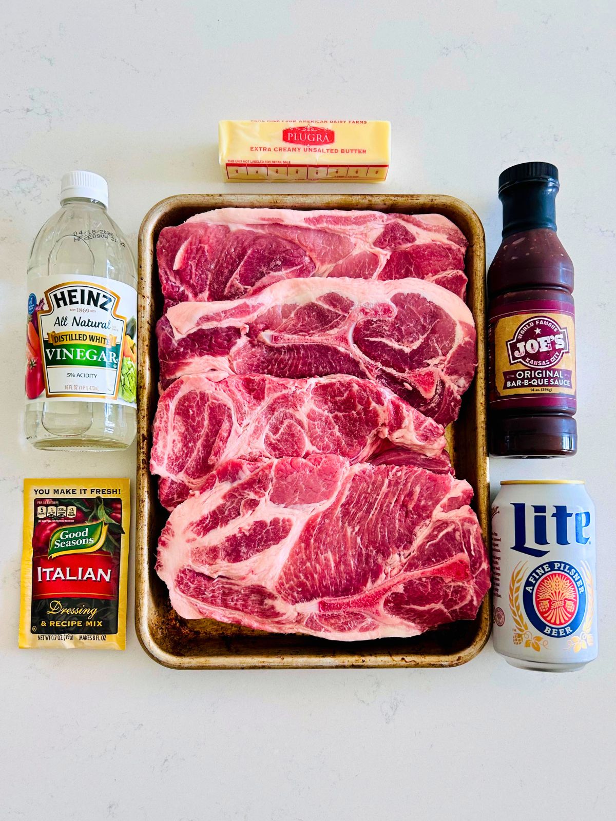 All of the ingredients needed to make easy BBQ pork steaks.
