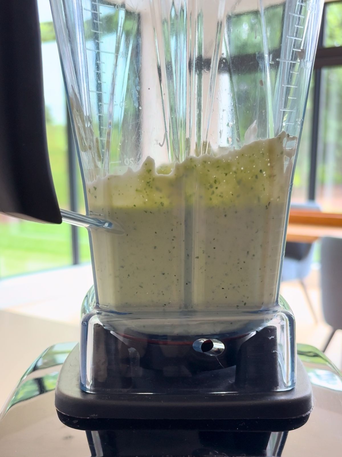 A blender has combined the ingredients to make jalapeño ranch.