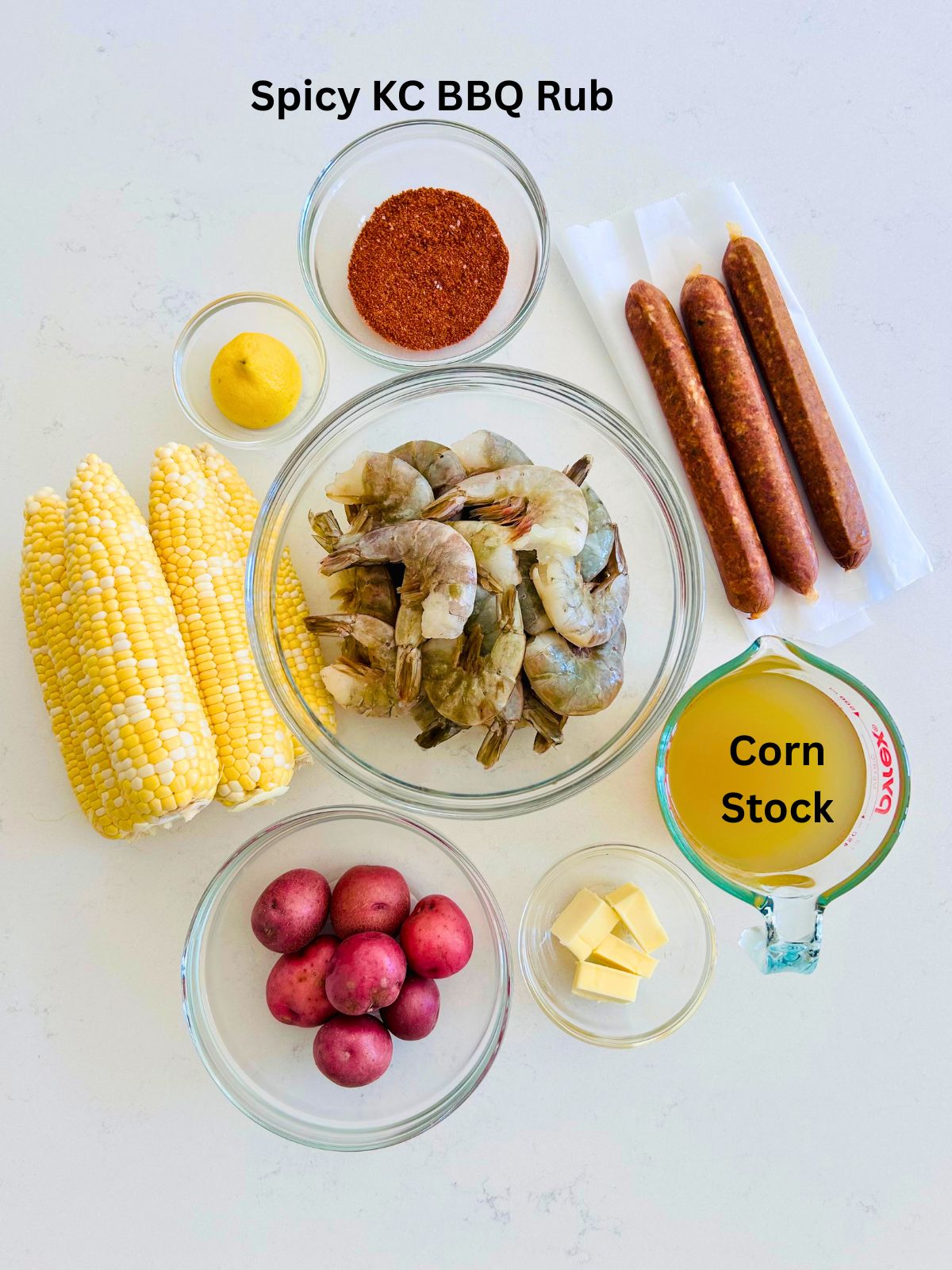 All of the ingredients to make oven-baked shrimp boil.